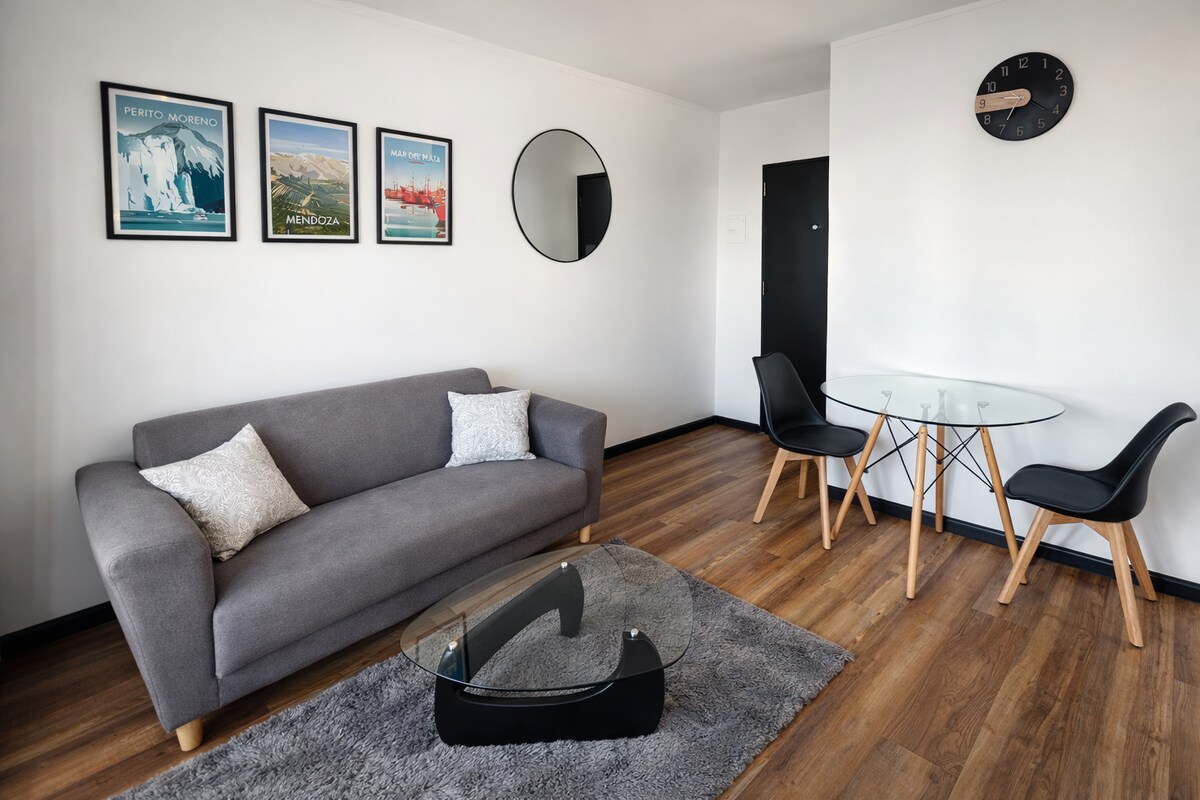 Renovated living room in Rosario apartment — Berra Group